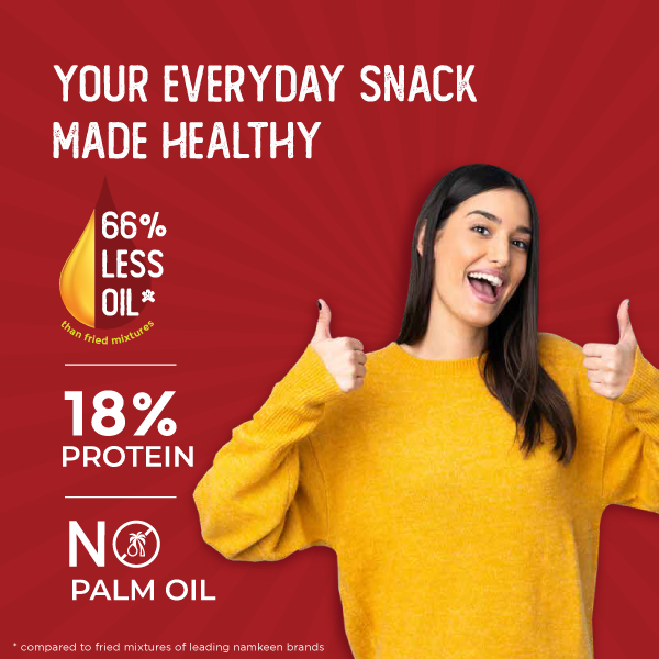 A smiling woman featuring healthy namkeen with 66% less oil, 18% protein, no palm oil.